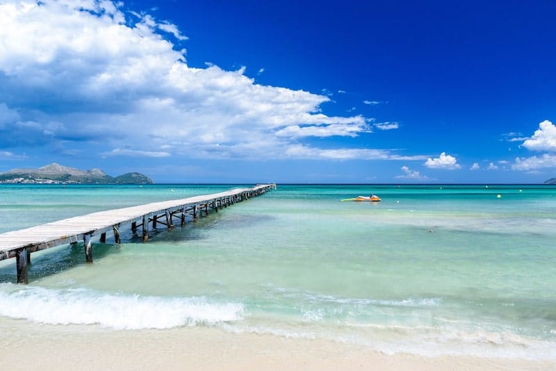 Long jetty and turquoise waters of Playa Muro