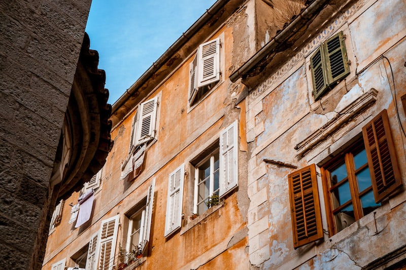Ochre building facades in old Kotor