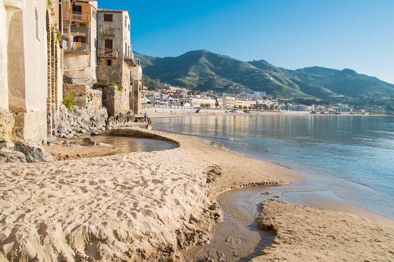Buildings right on the sand at Cefalu.