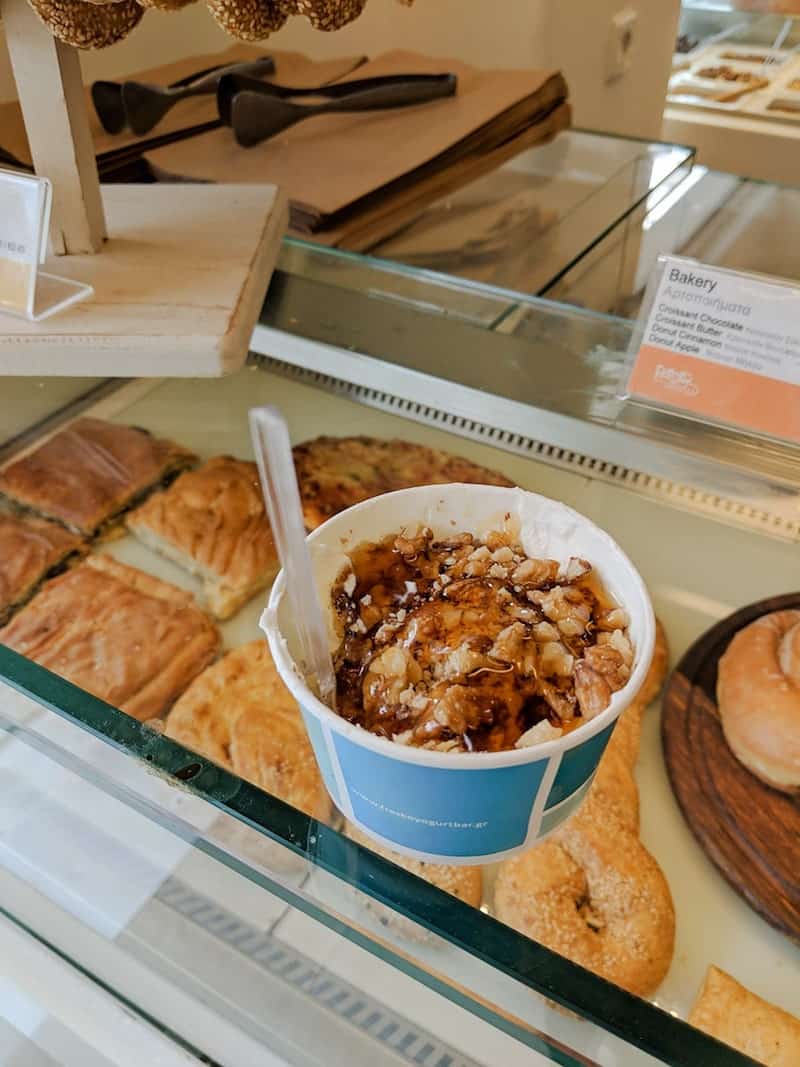 Greek yoghurt, honey and walnuts in a cup