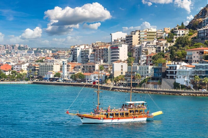 wooden tourist boat sails out of Kusadasi harbour