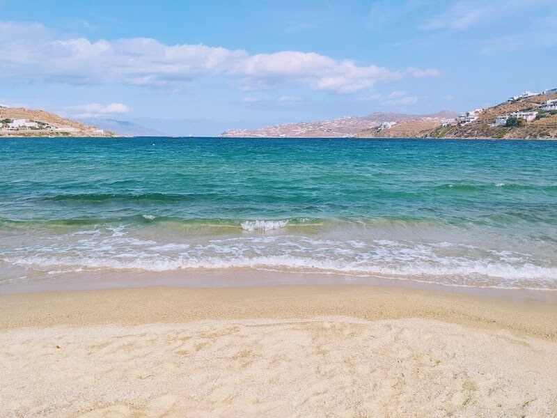 turquoise sea and sandy beach on Mykonos