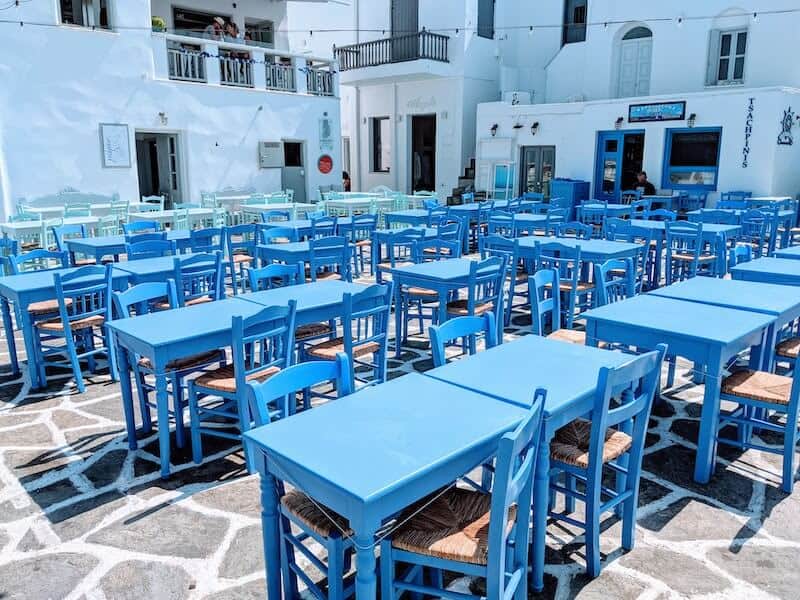 blue taverna tables in Naoussa