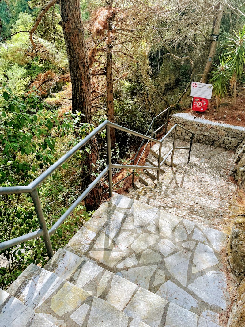 Steep steps down to La Grotta beach bar.