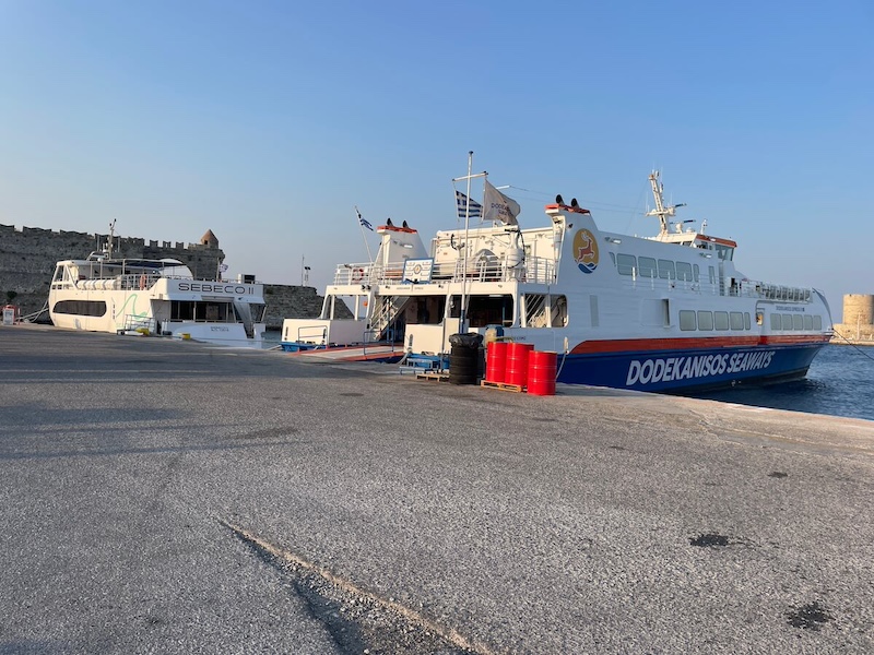 Dodekanisos Seaways and Sebeco ferries docked in Kolona.