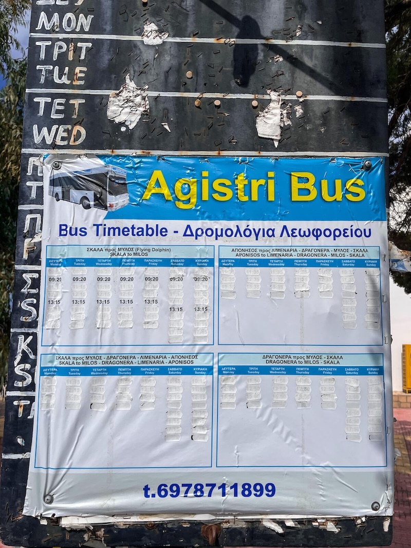 Close up of a bus timetable on an outdoors board.